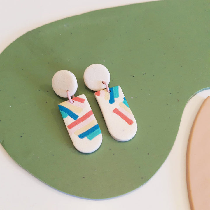 Ruth - Arc-en-ciel bleu et rose sur beige